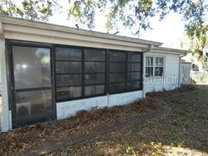 4392 Craftsbury Drive New Port Richey, FL 34652 - Photo 40 of 41 a view of backyard with cabin