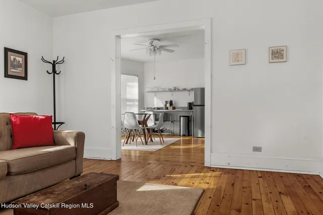a living room with furniture and a table