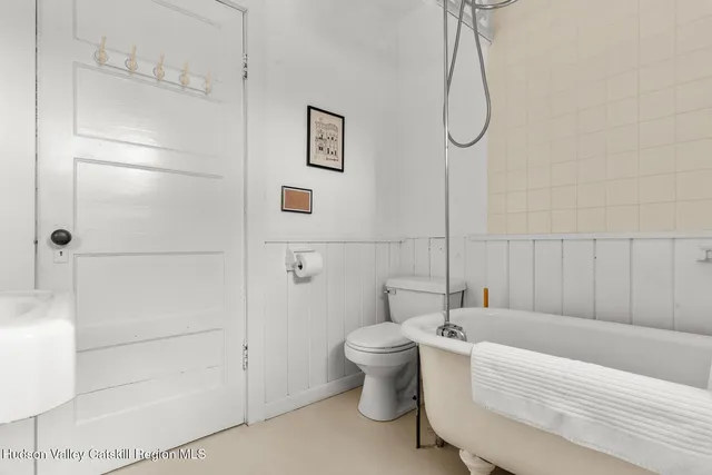 a bathroom with a sink a mirror and vanity