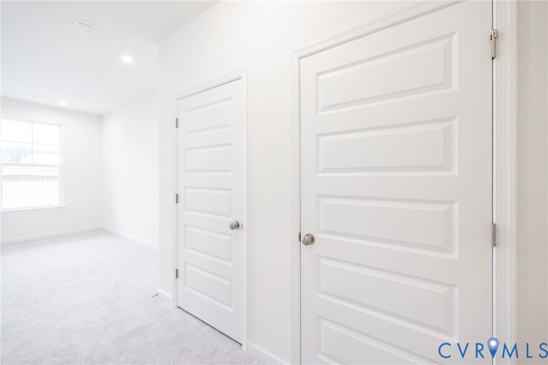 3731 Maze Runner Drive Midlothian, VA 23112 - Photo 17 of 32 a view of walk in closet with empty racks