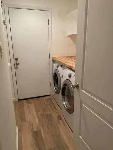 a utility room with dryer and washer