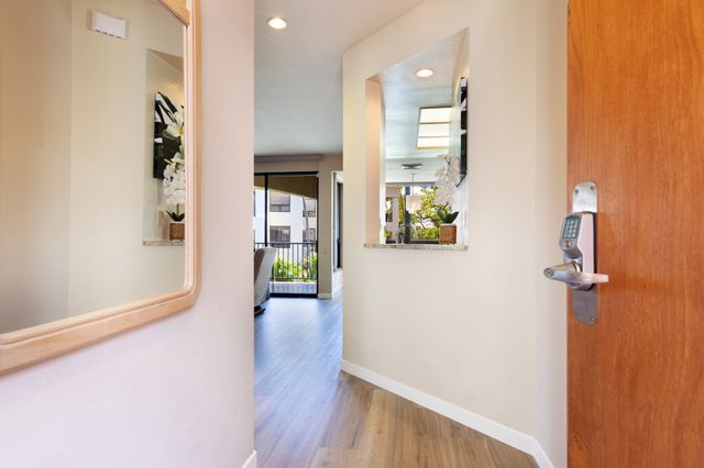 wooden floor in a hall with an entryway