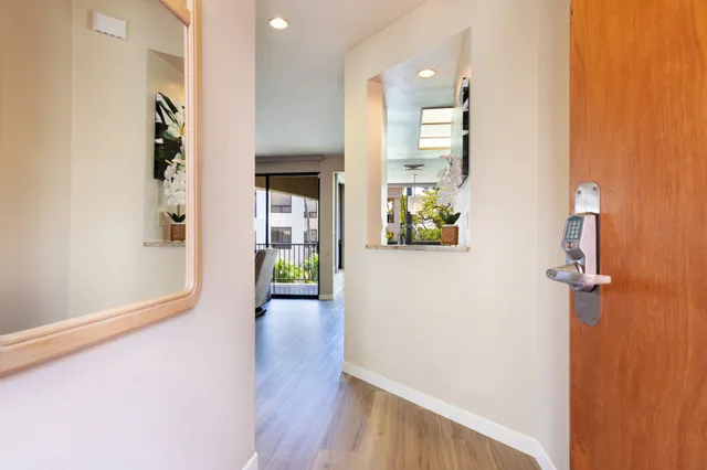 wooden floor in a hall with an entryway