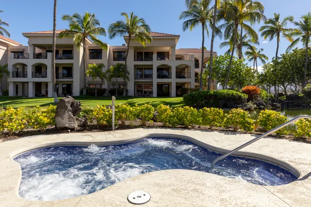 a view of a building with a garden