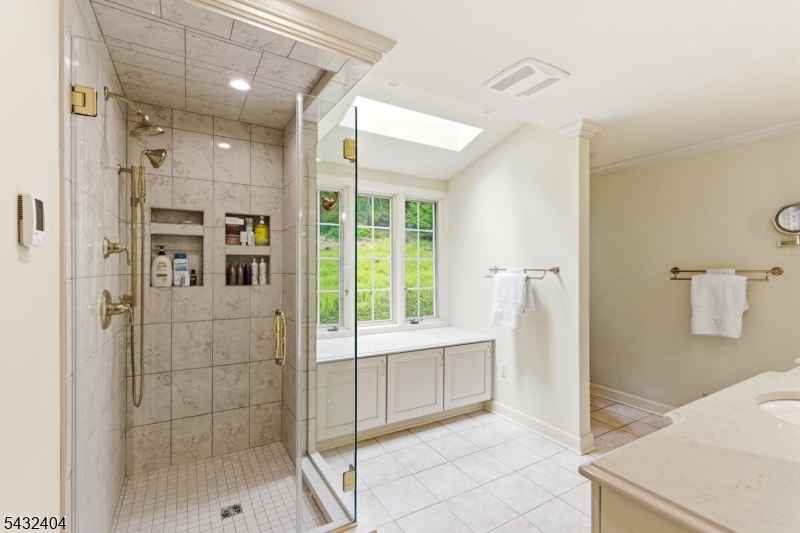 13 Hamden Road Flemington, NJ 08822 - Photo 26 of 37 a bathroom with a tub shower and sink