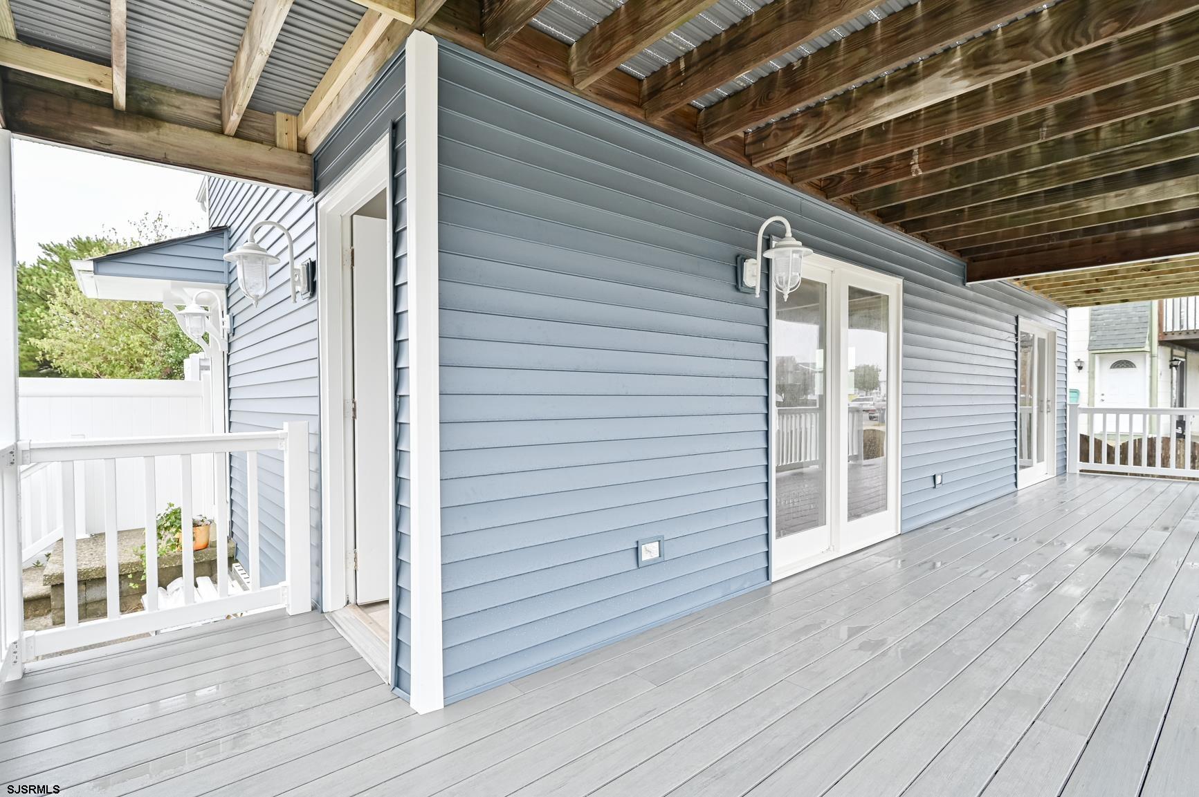 12 Lighthouse Drive, Unit A Brigantine, NJ 08203 - Photo 13 of 16 a view of a porch with wooden floor
