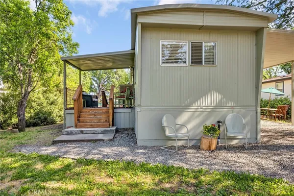 a view of a back yard of the house