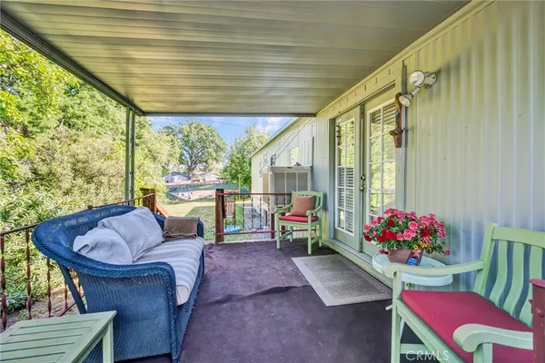 a outdoor living space with furniture and garden view