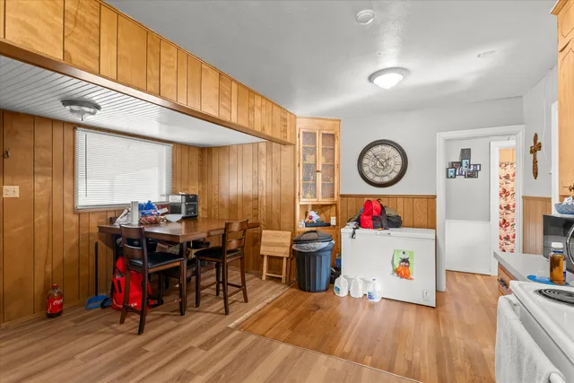 a room with furniture and wooden floor