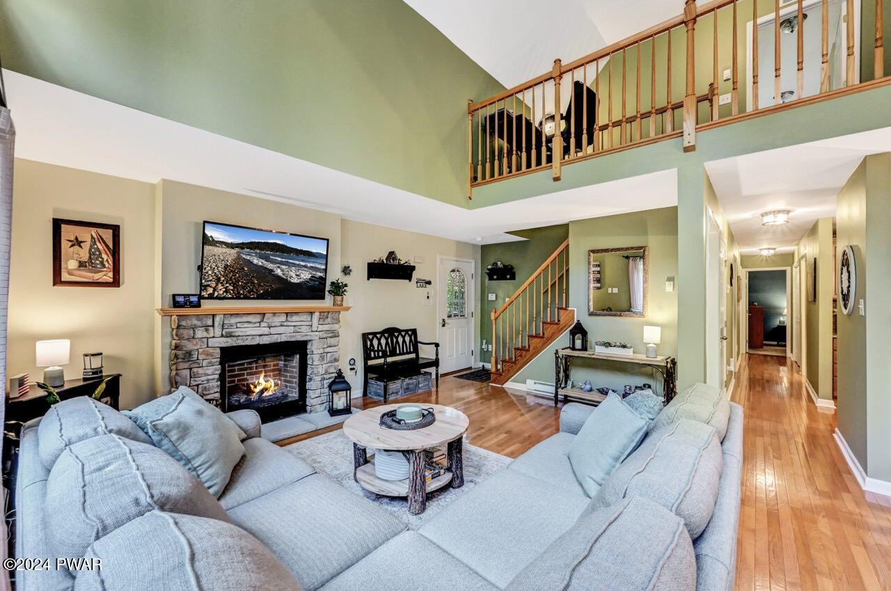 3295 Northgate Road Lake Ariel, PA 18436 - Photo 6 of 111 a living room with furniture and a fireplace