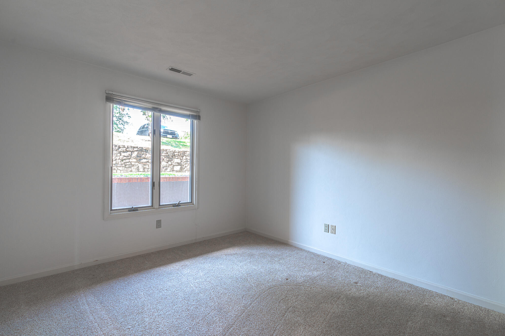 845 Gangplank Road, Unit 203 Moneta, VA 24121 - Photo 16 of 46 an empty room with a window