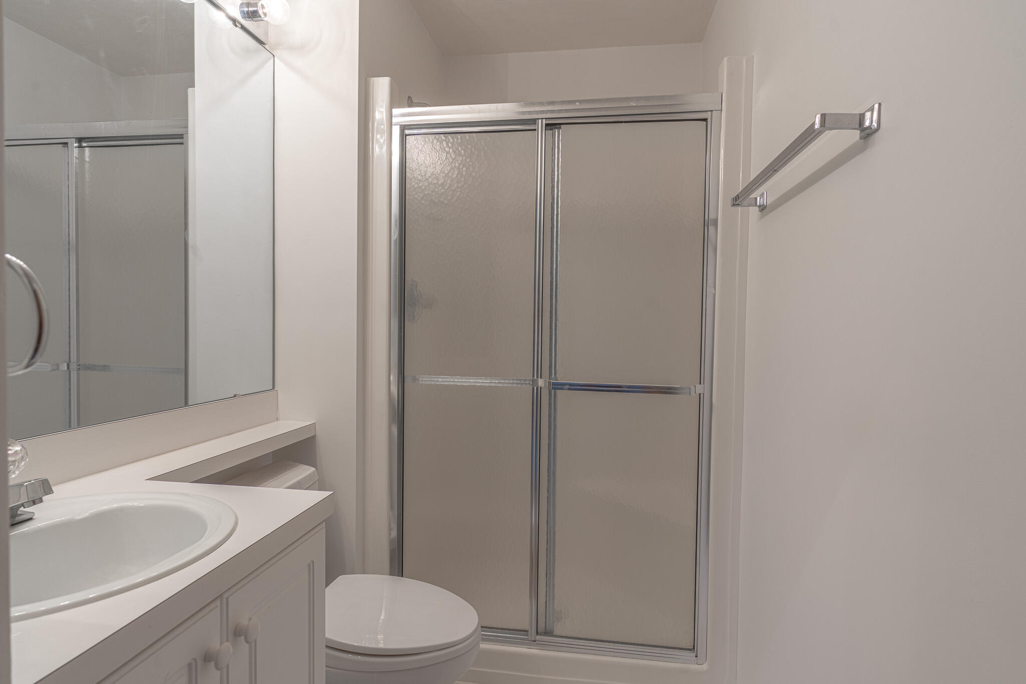 845 Gangplank Road, Unit 203 Moneta, VA 24121 - Photo 19 of 46 a bathroom with a sink a toilet and shower