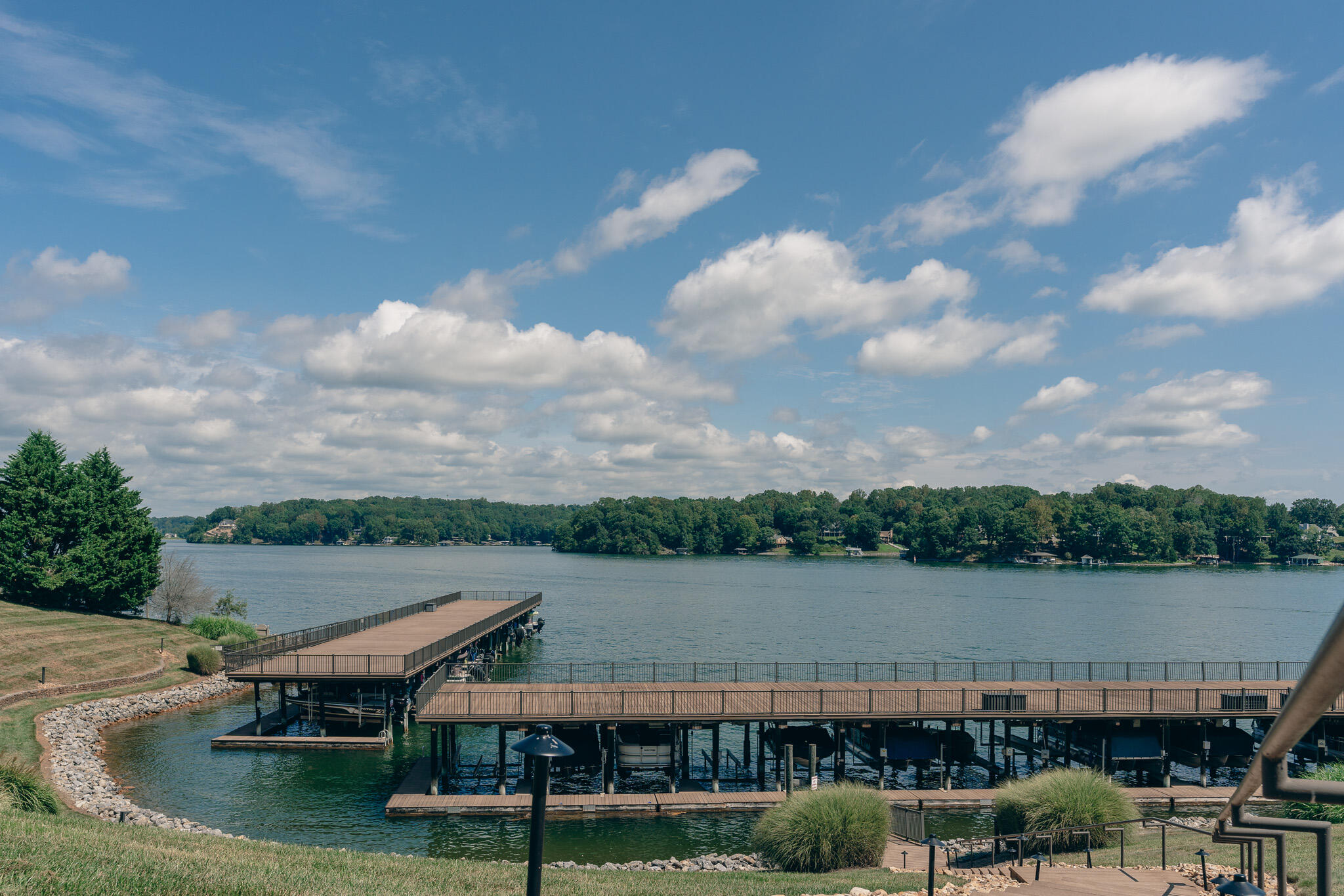 845 Gangplank Road, Unit 203 Moneta, VA 24121 - Photo 23 of 46 a view of a lake with houses in back
