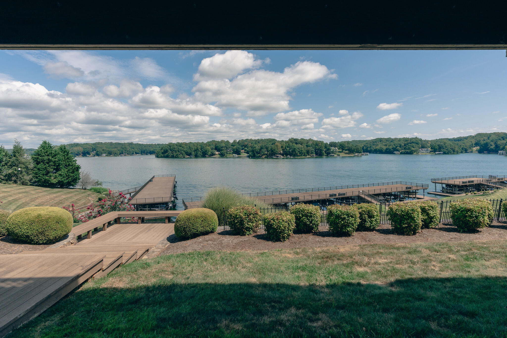 845 Gangplank Road, Unit 203 Moneta, VA 24121 - Photo 26 of 46 a view of a lake with a yard