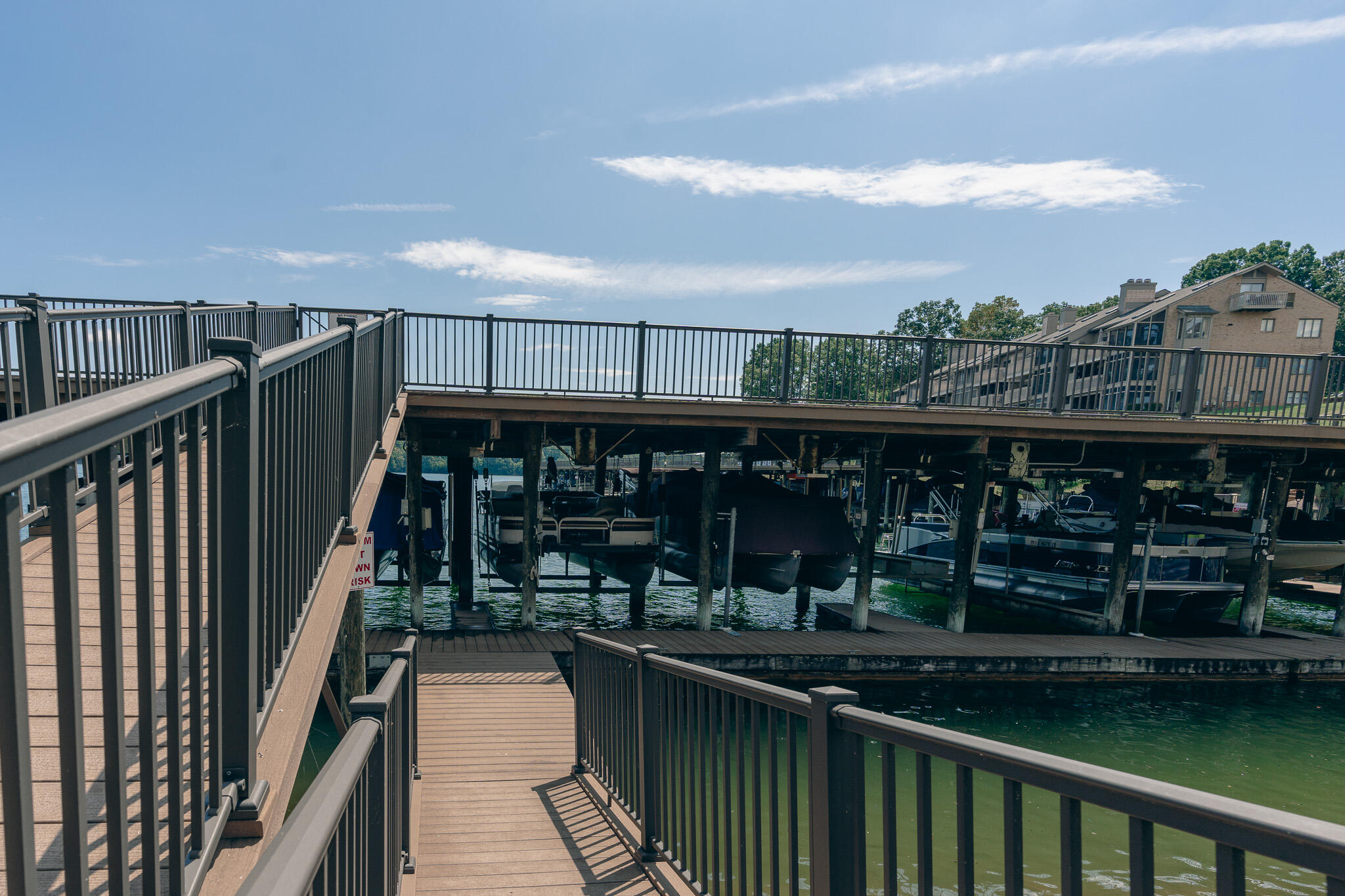 845 Gangplank Road, Unit 203 Moneta, VA 24121 - Photo 28 of 46 a view of a balcony with wooden floor