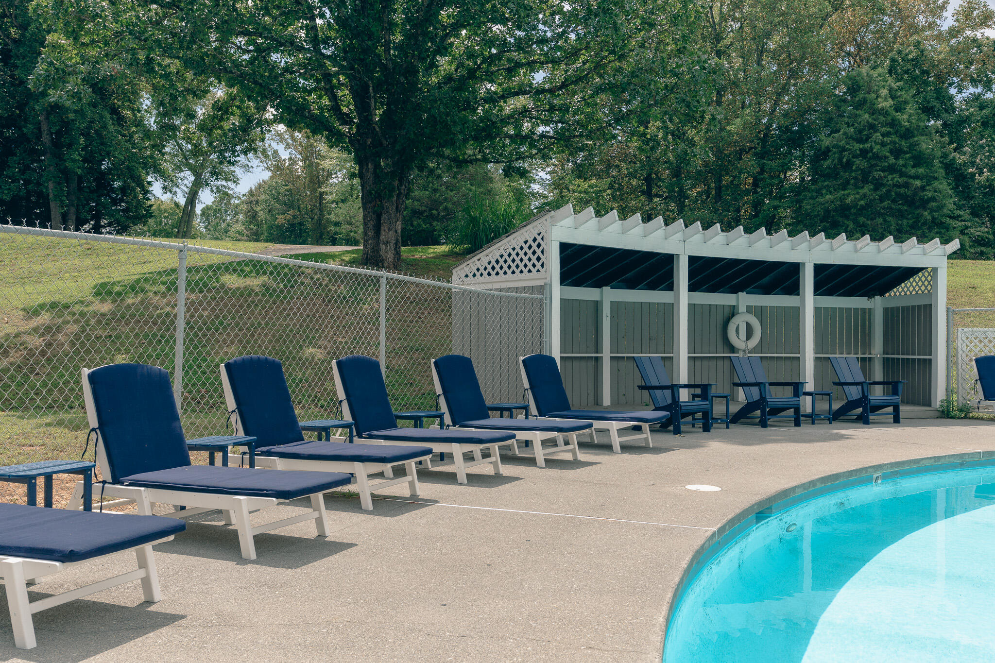 845 Gangplank Road, Unit 203 Moneta, VA 24121 - Photo 33 of 46 a swimming pool with outdoor seating