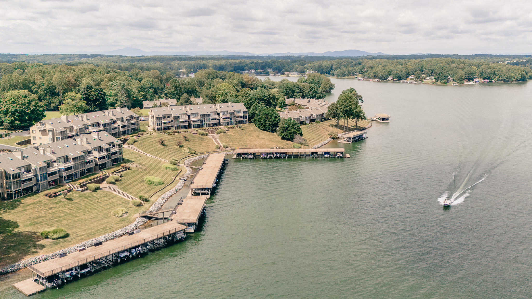 845 Gangplank Road, Unit 203 Moneta, VA 24121 - Photo 37 of 46 an aerial view of a house with a lake view