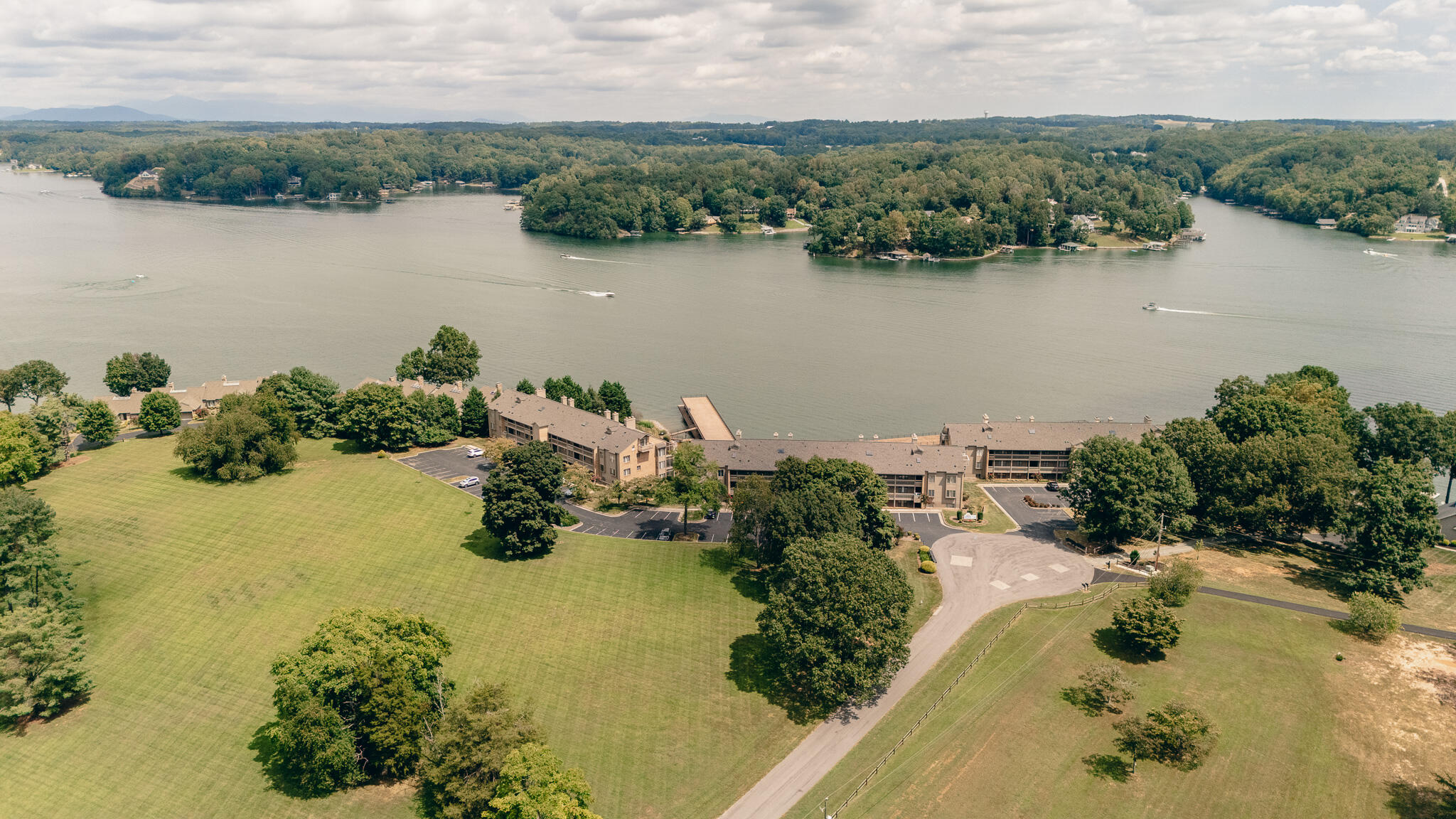 845 Gangplank Road, Unit 203 Moneta, VA 24121 - Photo 38 of 46 an aerial view of lake residential house with outdoor space and trees all around