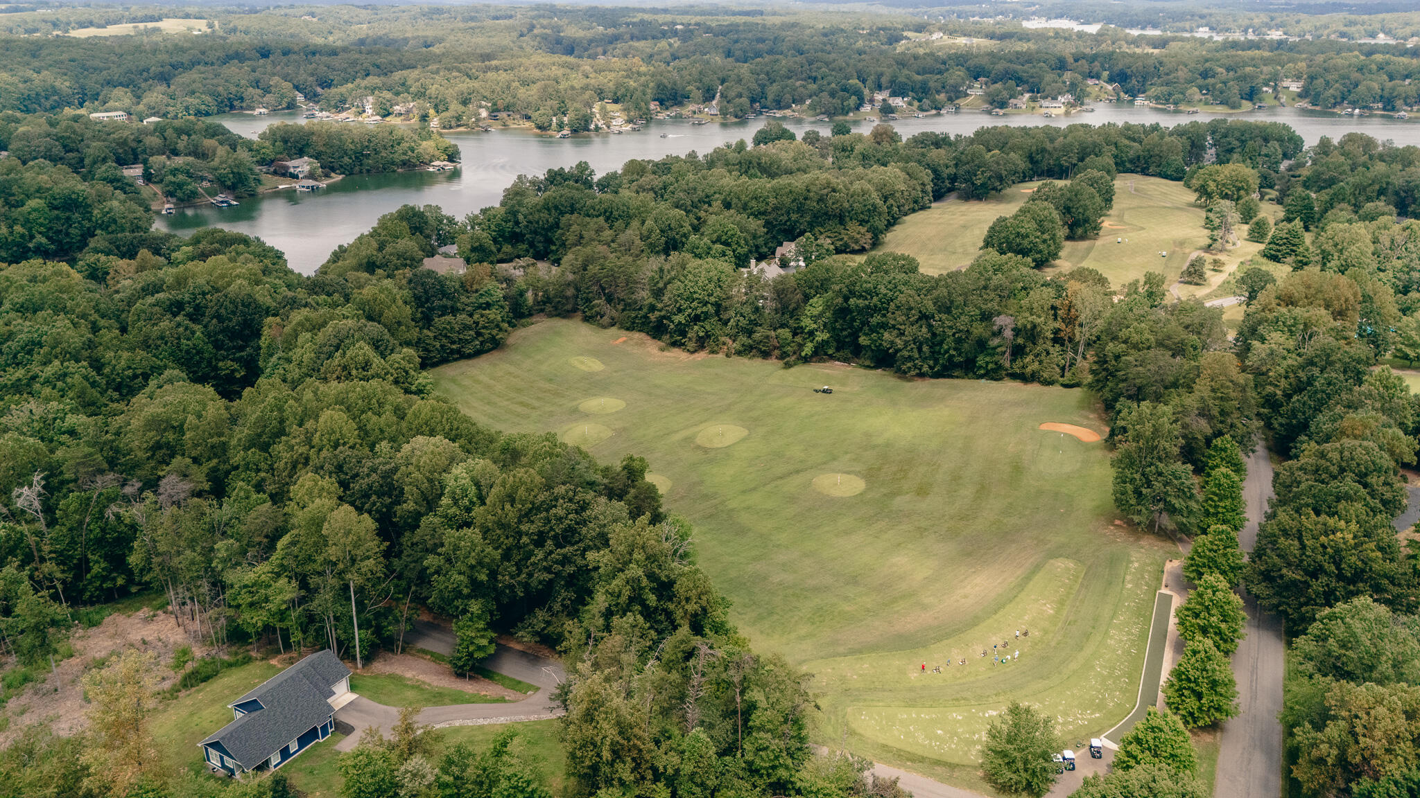 845 Gangplank Road, Unit 203 Moneta, VA 24121 - Photo 43 of 46 an aerial view of residential houses with outdoor space and trees