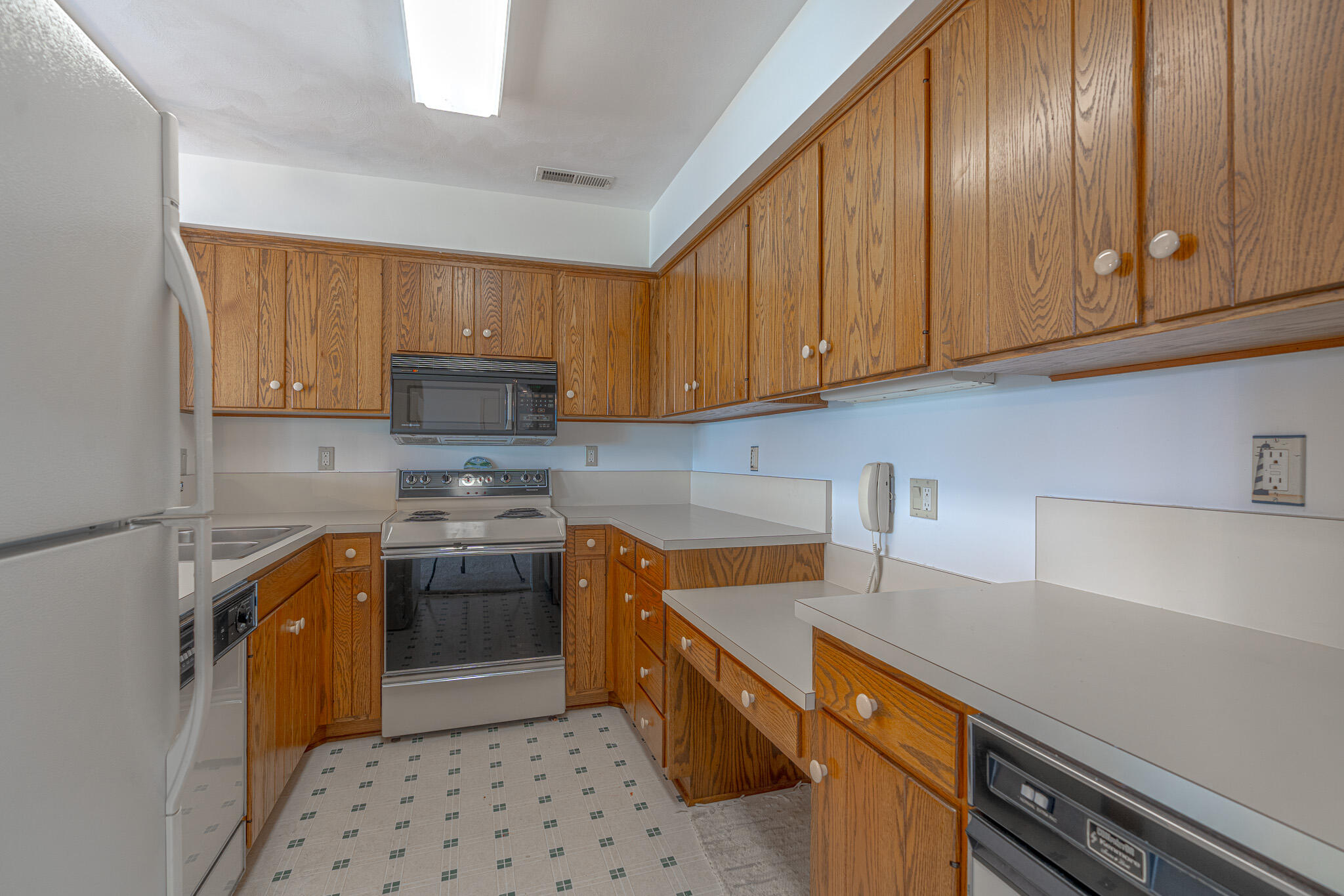845 Gangplank Road, Unit 203 Moneta, VA 24121 - Photo 10 of 46 a kitchen with stainless steel appliances granite countertop a sink stove and refrigerator