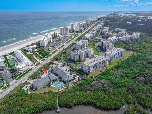 a view of a city with a lake