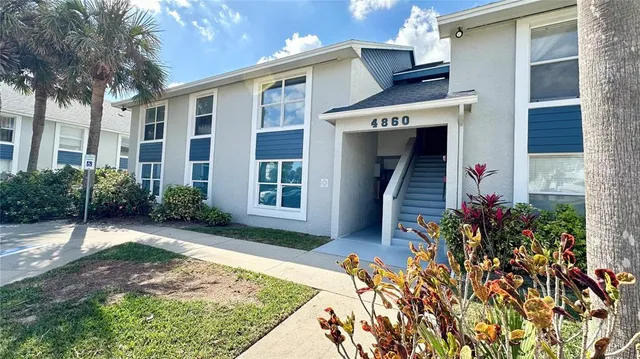 a front view of a house with a porch