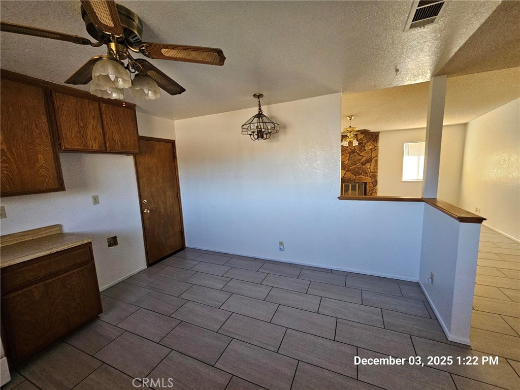 18891 Rock Springs Road Hesperia, CA 92345 - Photo 12 of 25 a view of a storage & utility room