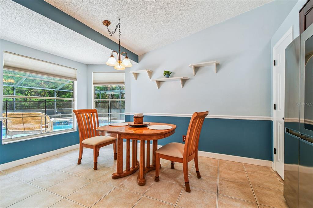 6006 Redhawk Drive New Port Richey, FL 34655 - Photo 24 of 90 a view of a dining room with furniture window and outside view