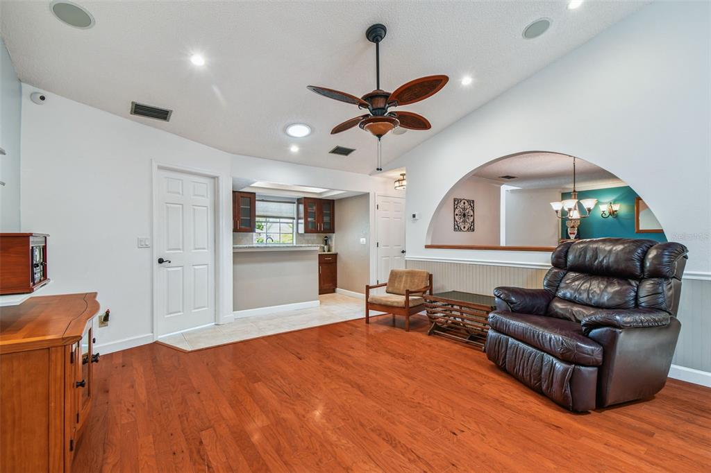 6006 Redhawk Drive New Port Richey, FL 34655 - Photo 29 of 90 a living room with furniture and a wooden floor