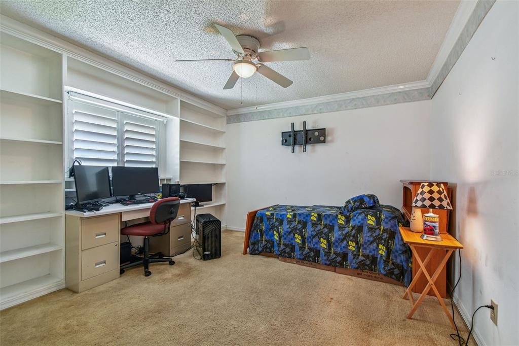 6006 Redhawk Drive New Port Richey, FL 34655 - Photo 61 of 90 a view of a workspace with furniture and a window