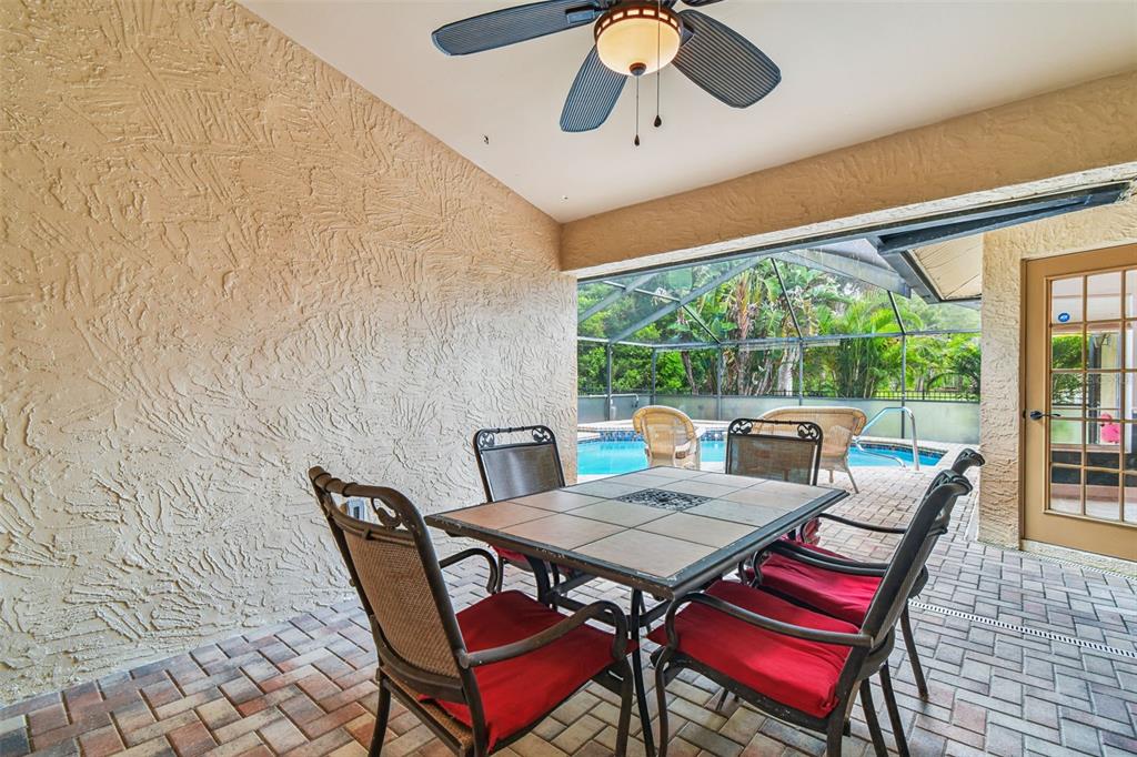 6006 Redhawk Drive New Port Richey, FL 34655 - Photo 75 of 90 a view of a dining room with furniture window and outside view