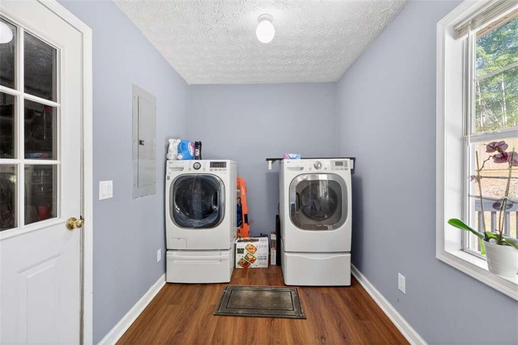 386 Ridgewood Drive Pendergrass, GA 30567 - Photo 17 of 50 a utility room with sink dryer and washer