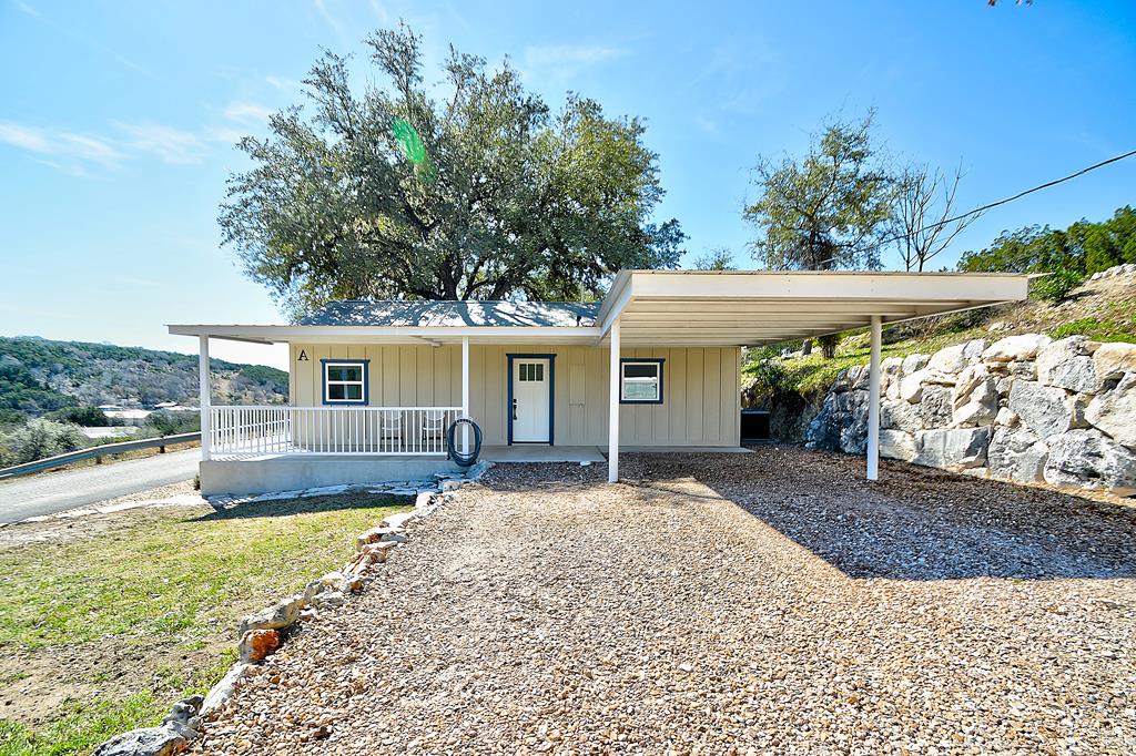 110 A Garner Road Kerrville, TX 78028 - Photo 1 of 46 front view of a house with a patio