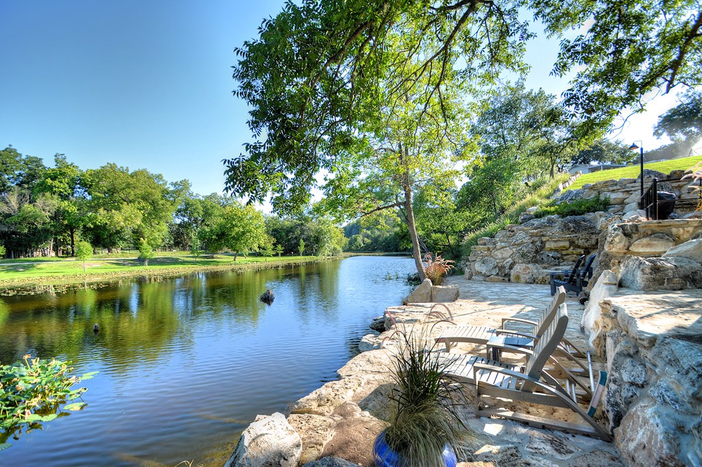 110 A Garner Road Kerrville, TX 78028 - Photo 2 of 46 a body of water with a tree in the background