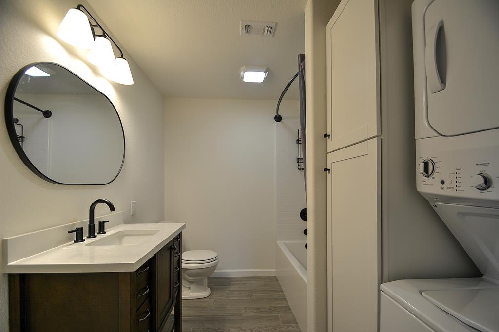 110 A Garner Road Kerrville, TX 78028 - Photo 23 of 46 a bathroom with a sink and mirror