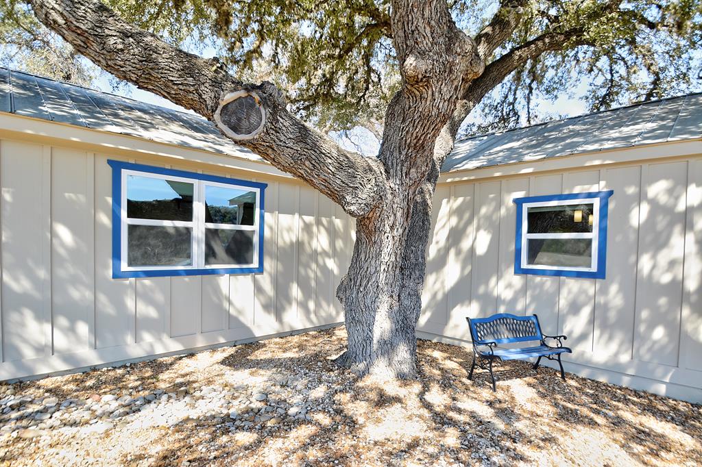 110 A Garner Road Kerrville, TX 78028 - Photo 34 of 46 a front view of a house with a yard