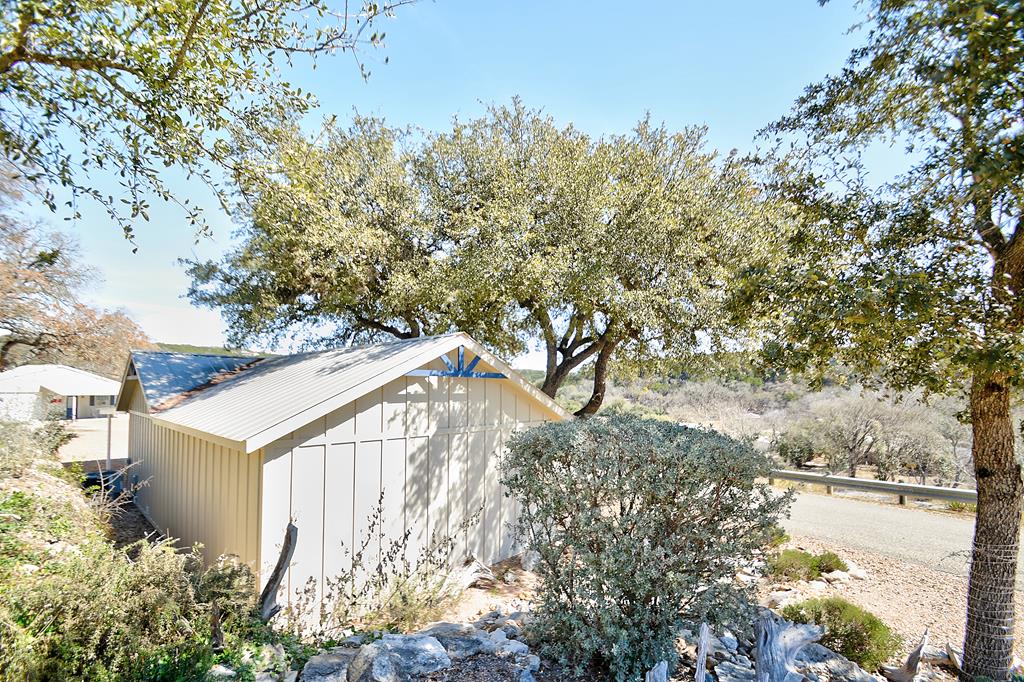 110 A Garner Road Kerrville, TX 78028 - Photo 39 of 46 a view of a house with a yard