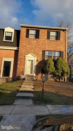 a front view of a house with yard