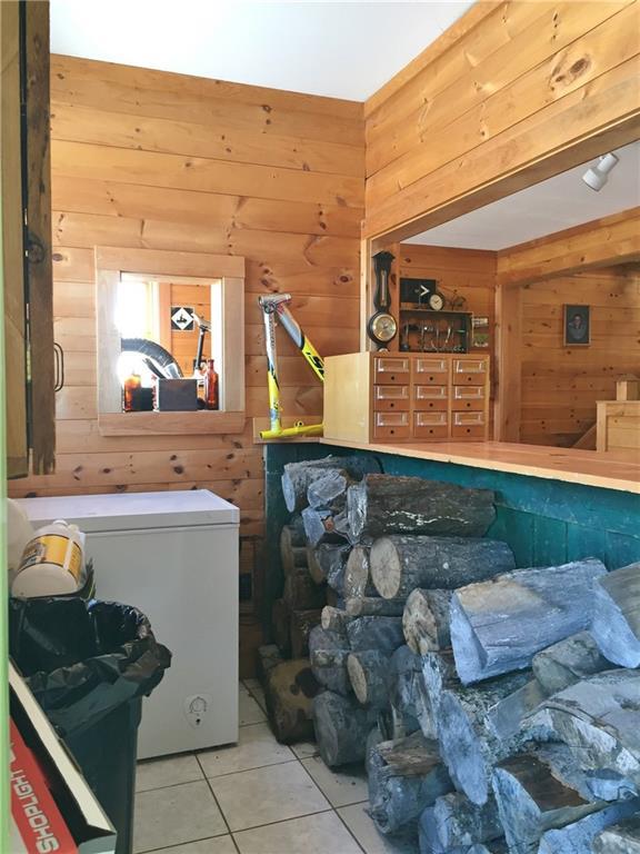 214 Savage Road Farmington, ME 04938 - Photo 13 of 29 Wood storage or a huge pantry!