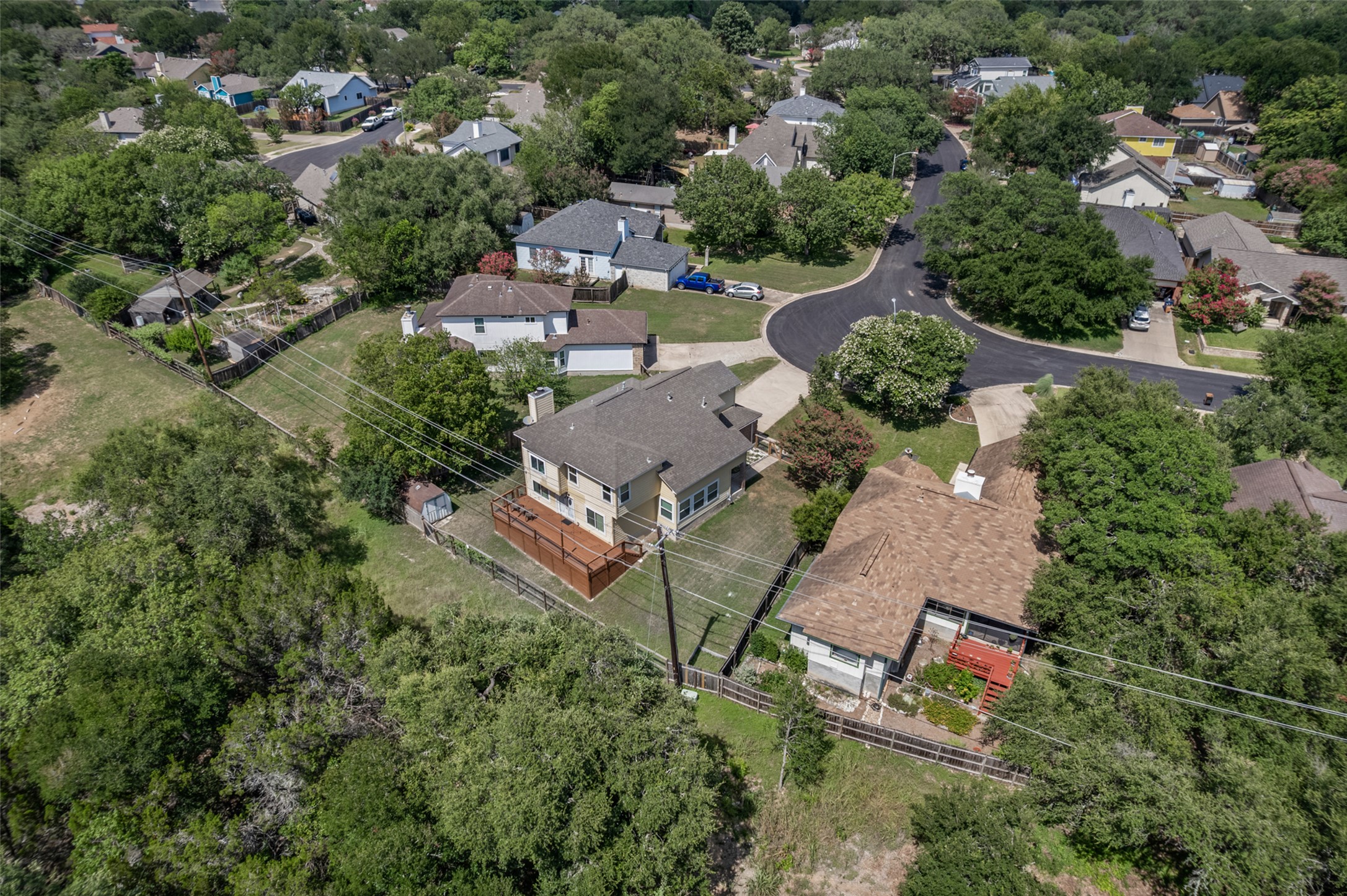3011 Wadsworth Way Austin, TX 78748 - Photo 3 of 35 An aerial perspective reveals a private fenced yard and a spacious deck, ideal for outdoor living.