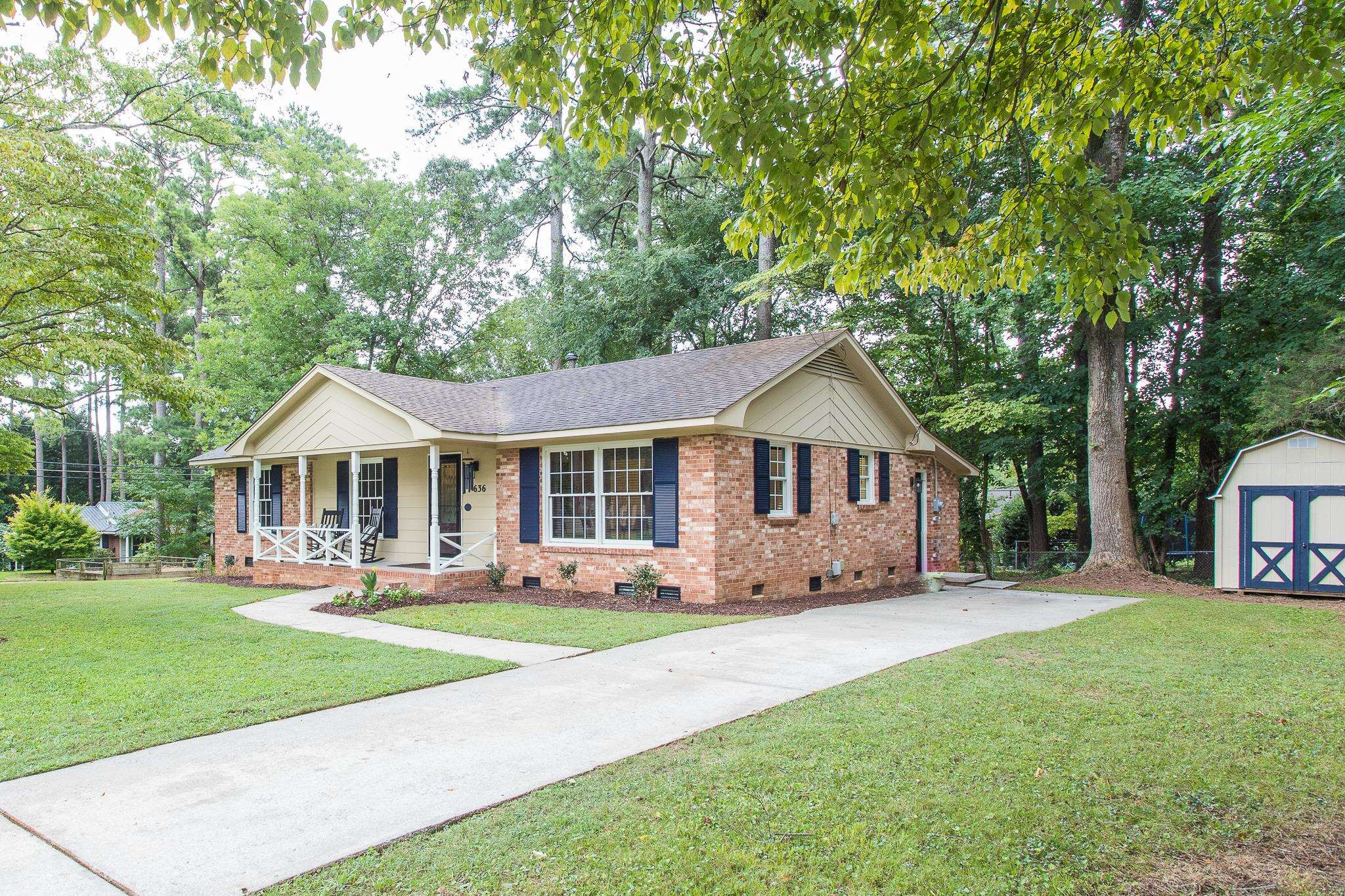 636 Duke Drive Raleigh, NC 27609 - Photo 2 of 21 Home comes with a storage shed and a built in Chicken Coop. All windows, front & side doors have been updated. Exterior Front