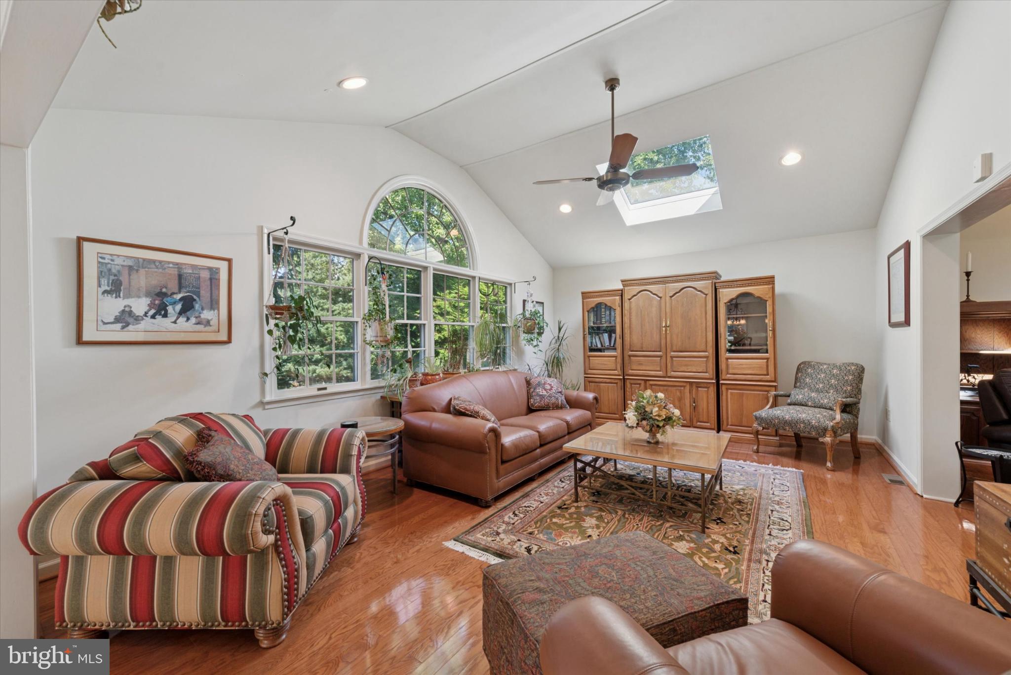 856 Monteith Drive Wayne, PA 19087 - Photo 16 of 35 a living room with furniture ceiling fan and a large window