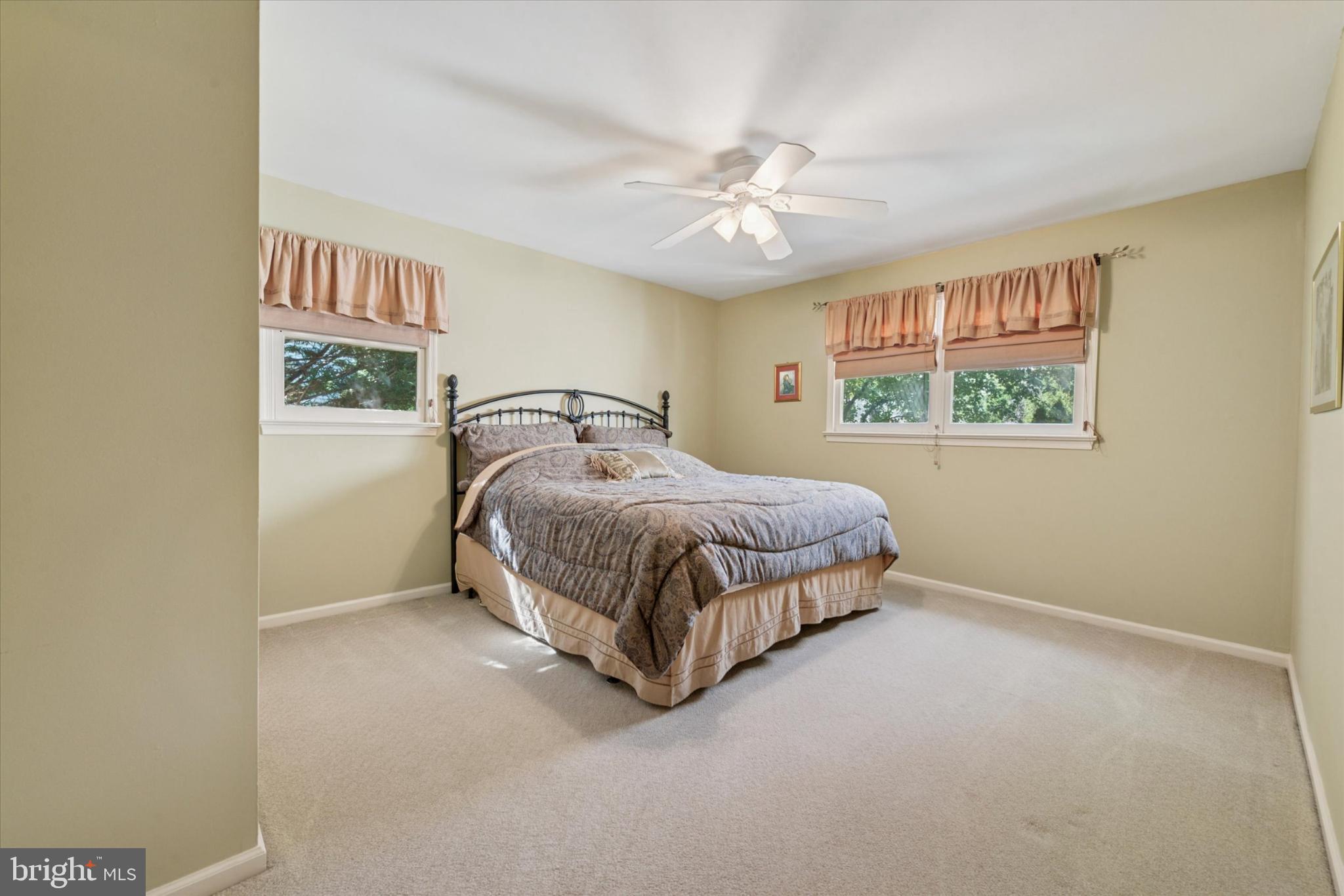 856 Monteith Drive Wayne, PA 19087 - Photo 28 of 35 a bedroom with a bed and a window