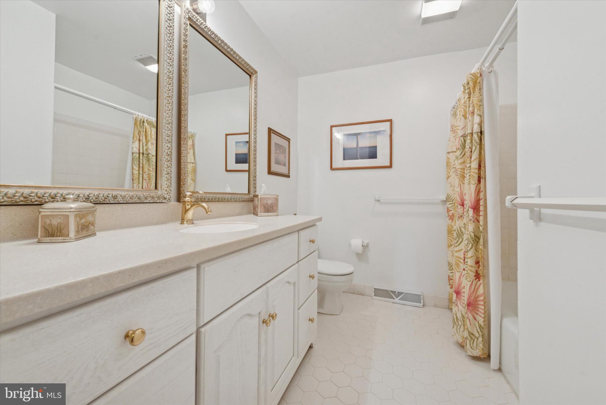 856 Monteith Drive Wayne, PA 19087 - Photo 31 of 35 a bathroom with a sink a toilet and shower