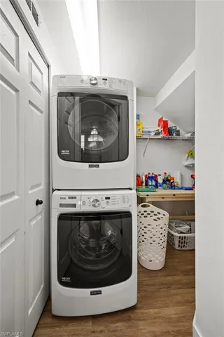 a close view of a utility room with washer and dryer