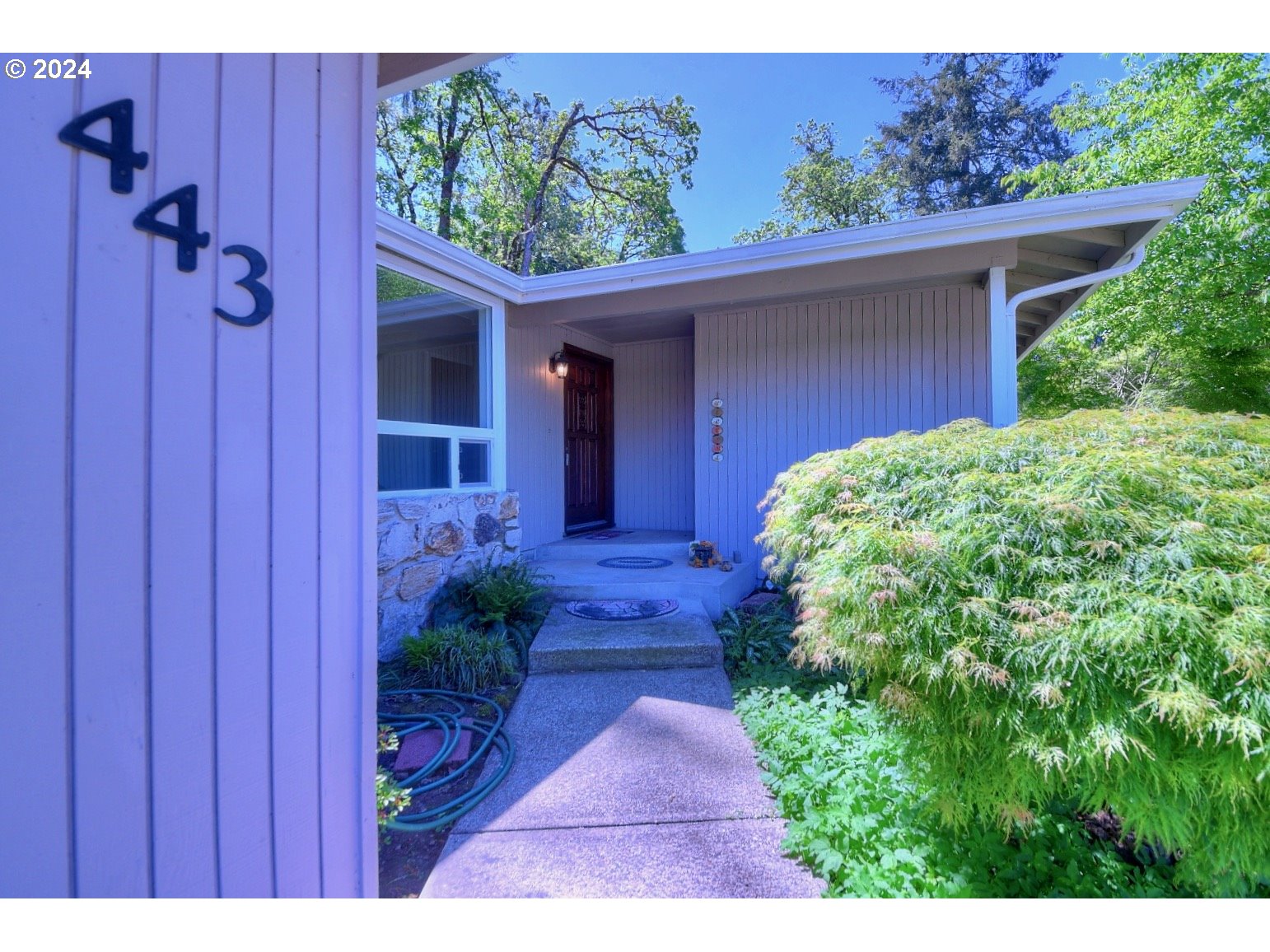 443 South 68th Place Springfield, OR 97478 - Photo 2 of 32 a view of a pathway in front of a house