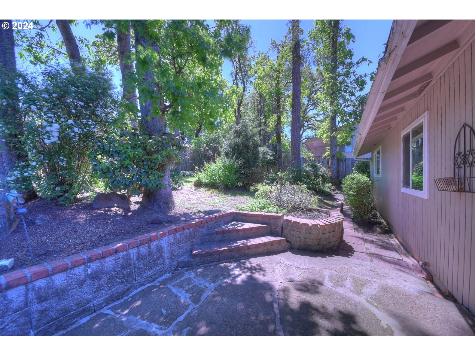 443 South 68th Place Springfield, OR 97478 - Photo 26 of 32 a view of a backyard with garden