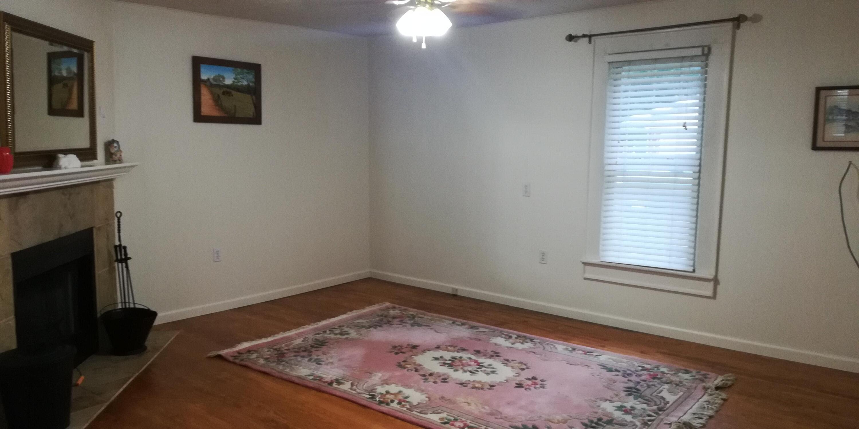 62 Campbell Creek Road Maggie Valley, NC 28751 - Photo 7 of 15 a view of a bedroom with a bed and a window