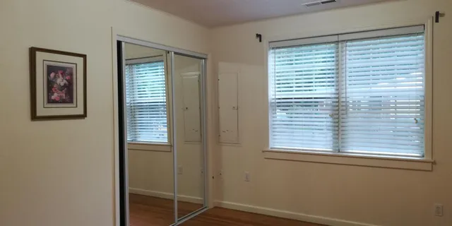 a view of an empty room with a window