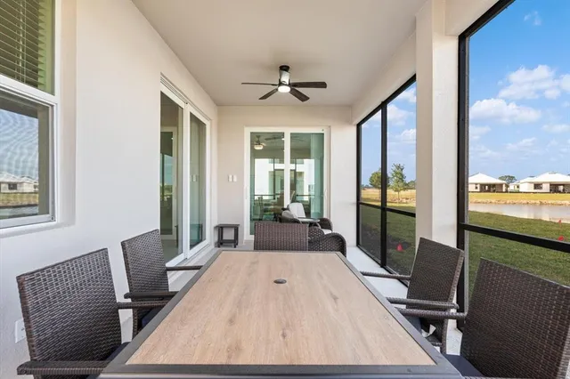 a view of a two chairs in a patio